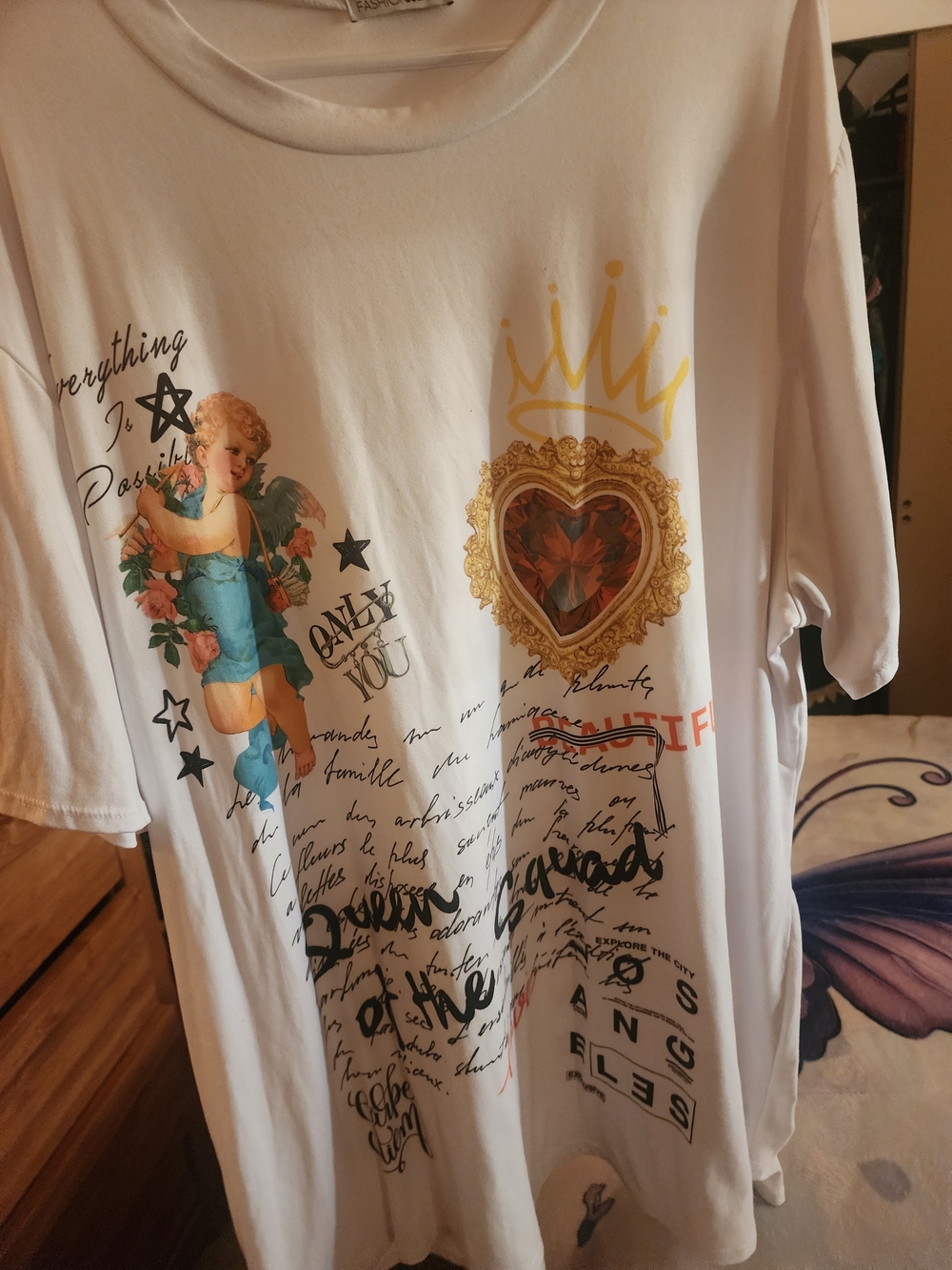 Over-sized White Graphic Short-Sleeve Tee with Gold Heart Crest